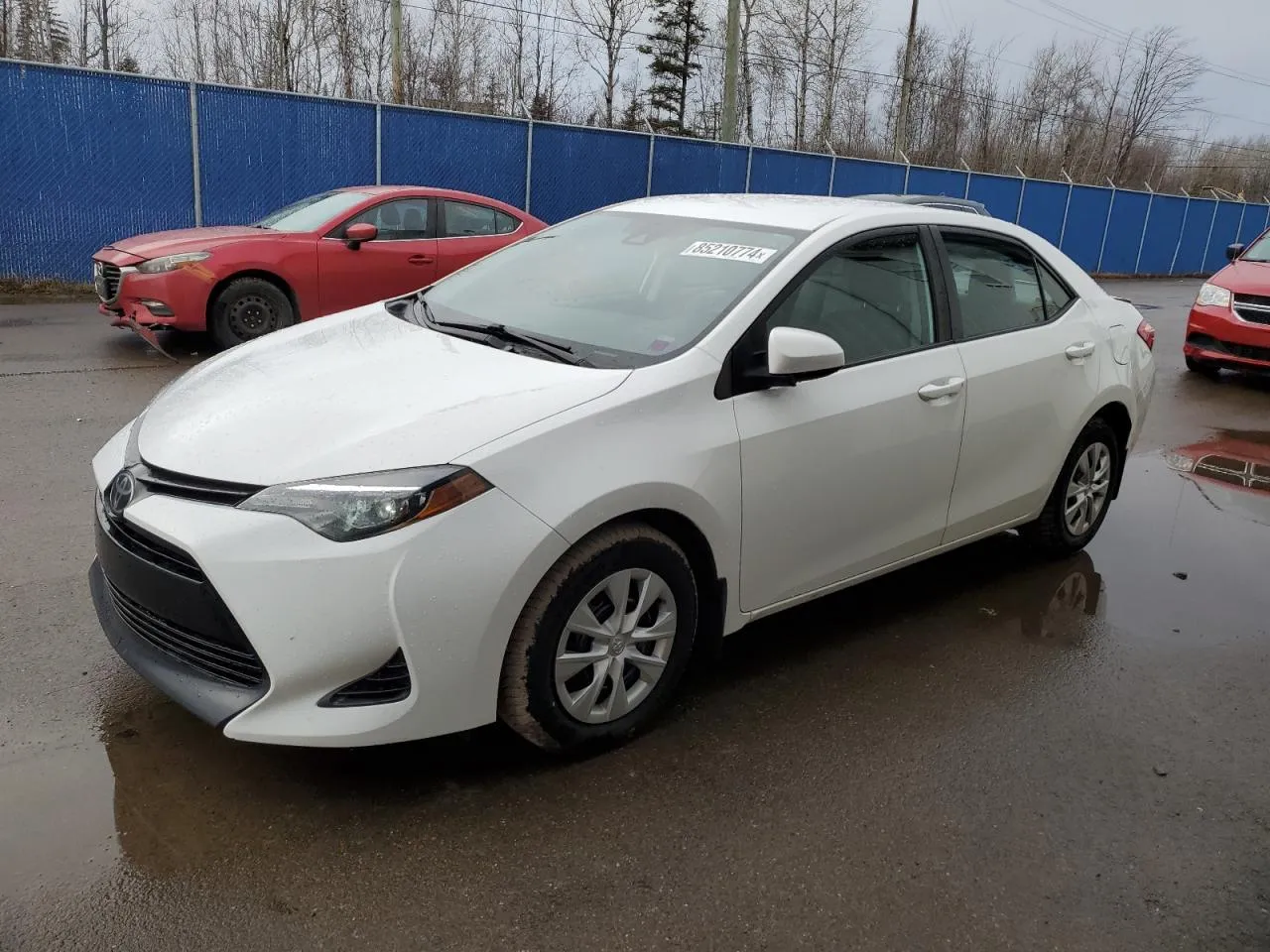White Toyota Corolla imported to Ghana